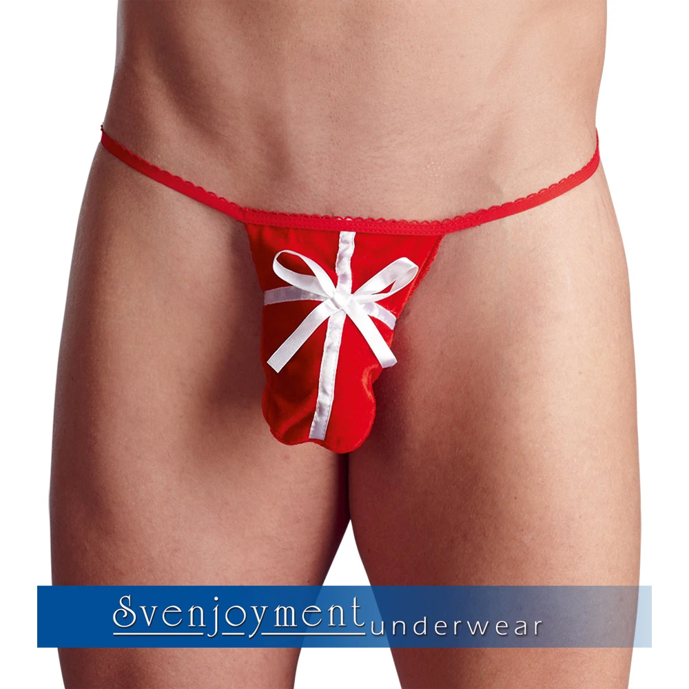 Roter String im Geschenk-Look aus streichelweichem Pannesamt mit weißen Satinbändern.